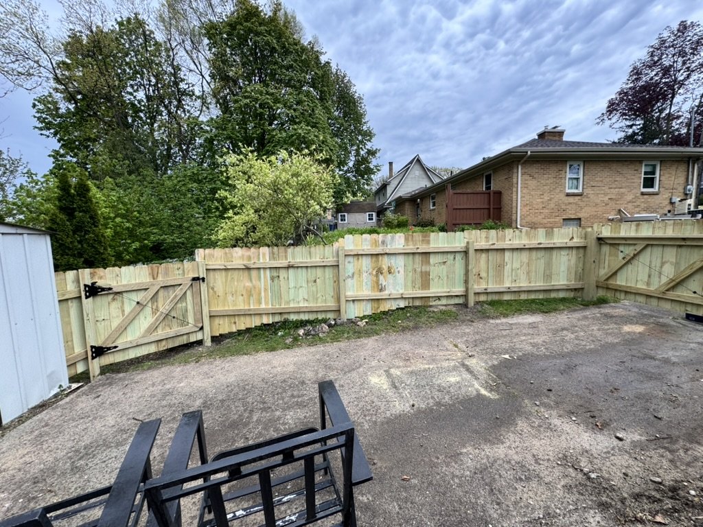 New wood privacy fence and gates built in West Michigan